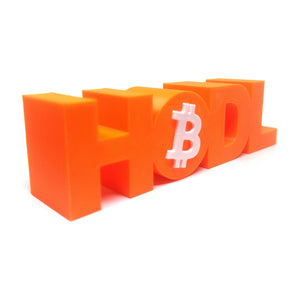 Three quarter view of the embossed HODL Bitcoin sign