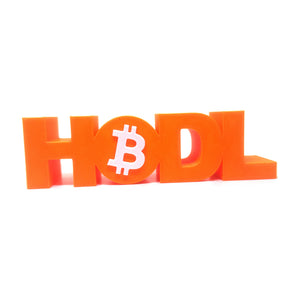 Angled view of the HODL Bitcoin sign with raised white Bitcoin logo