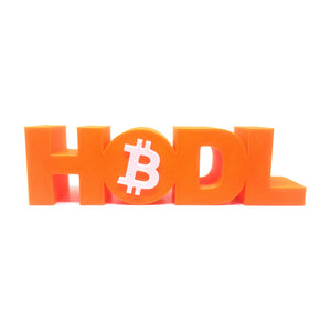Front view of the embossed HODL Bitcoin desk sign