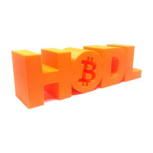 Angled view of the HODL Bitcoin sign with engraved Bitcoin logo